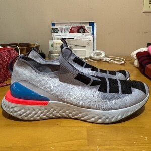 NIKE EPIC PHANTOM REACT FLYKNIT SNEAKERS.